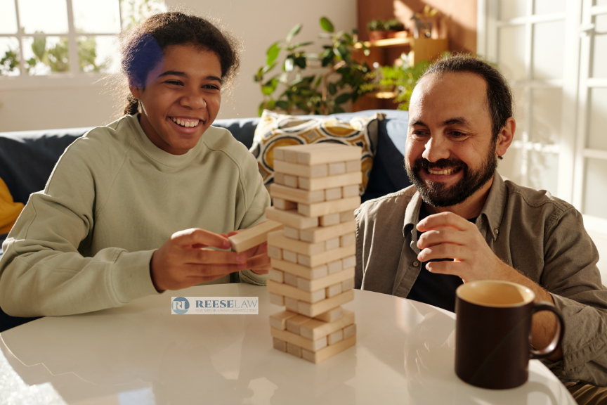 Dad and daughter after child custody modification using a family law attorney near Washington, DC